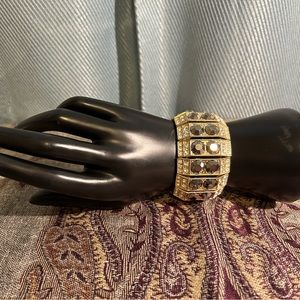 Expandable crystal gold toned bracelet